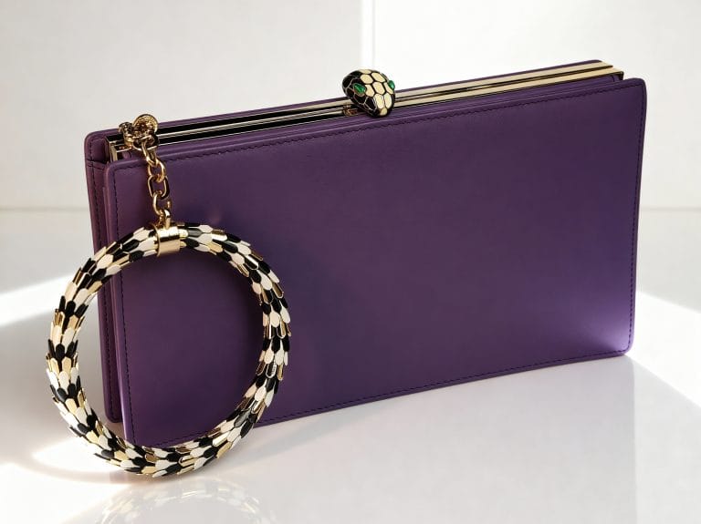 Purple clutch bag with a black-and-white beaded bangle handle – fashion accessory product photography