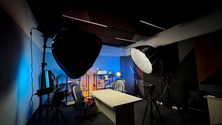 Sparkia Media production studio with softbox lights and blue ambient lighting